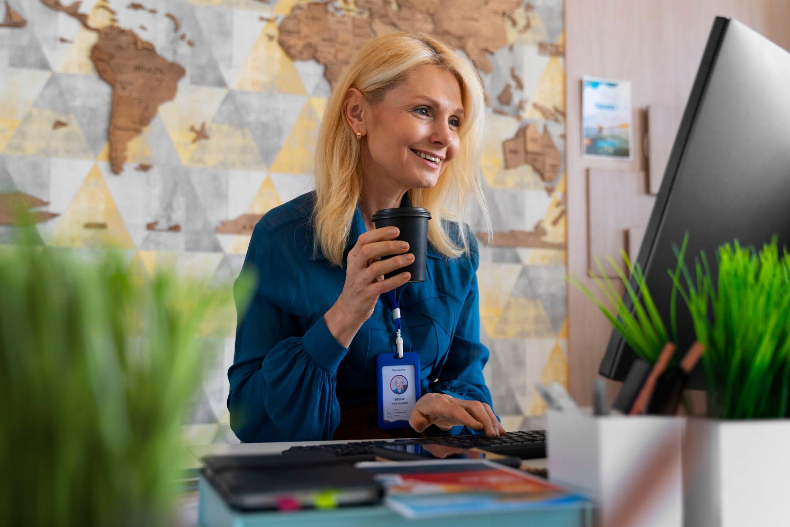 medium-shot-woman-working-office-travel-agency (1)